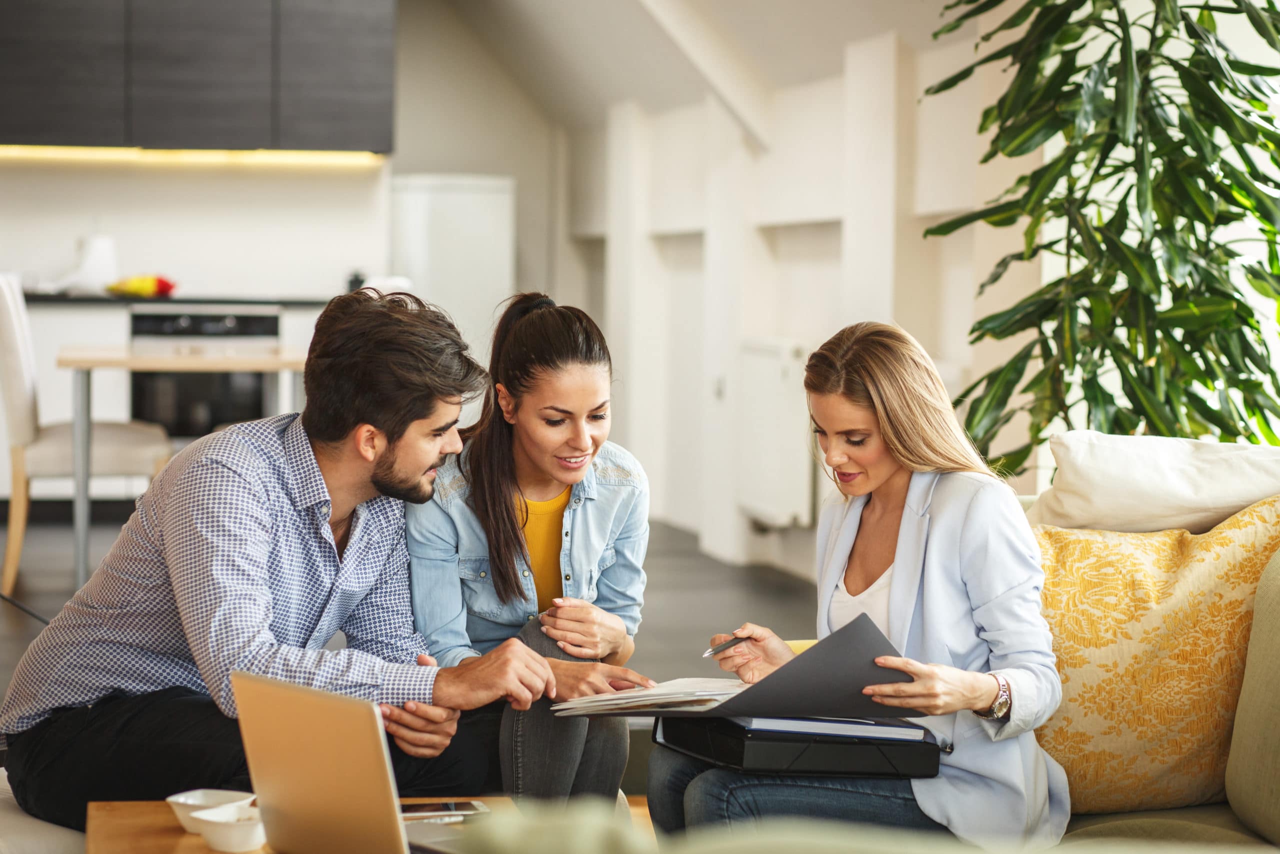 Couple talking to loan officer