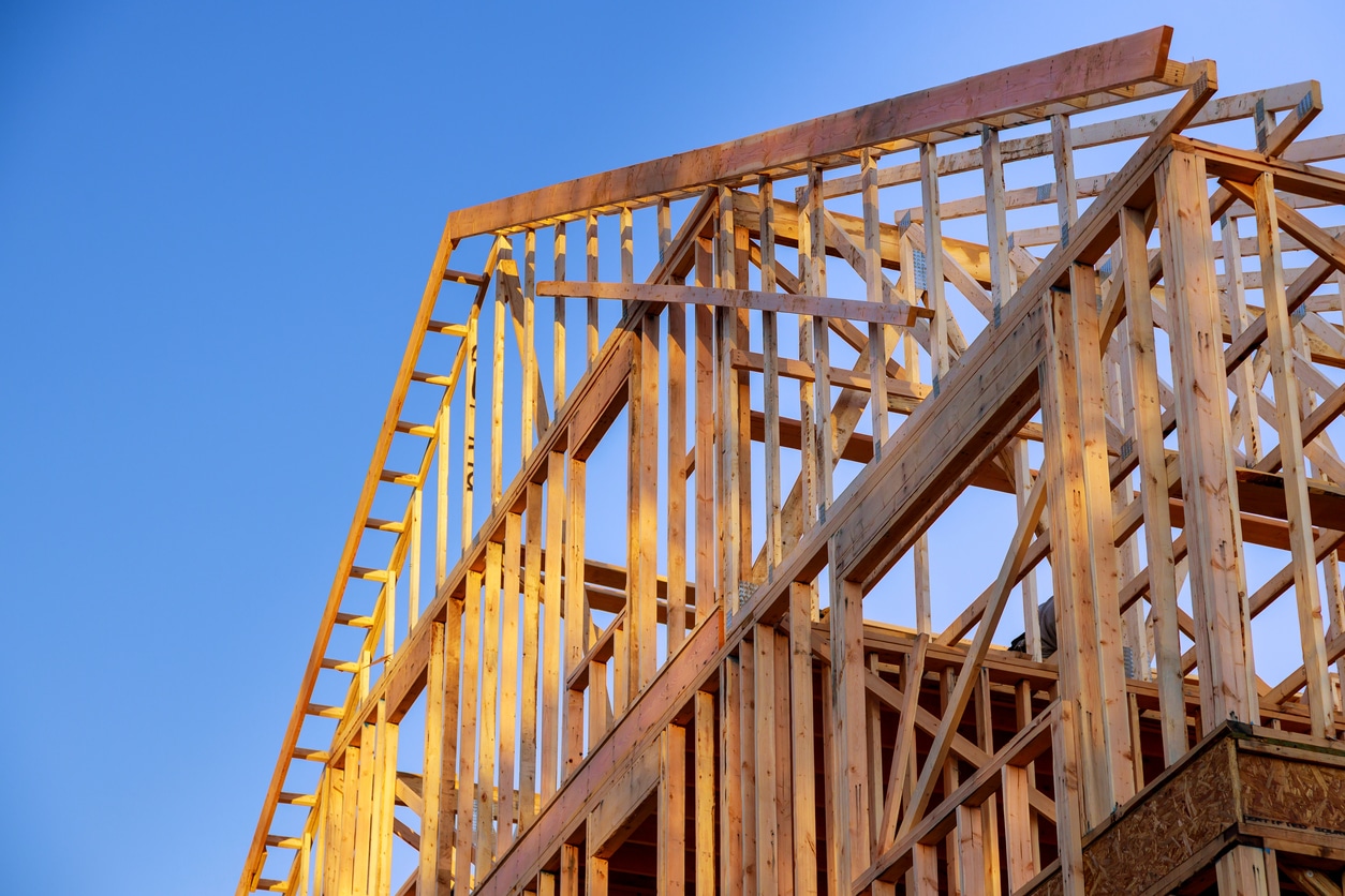 a building under construction with a blue sky in the background