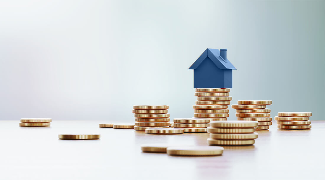 Featured image of a blue house sitting on coins.