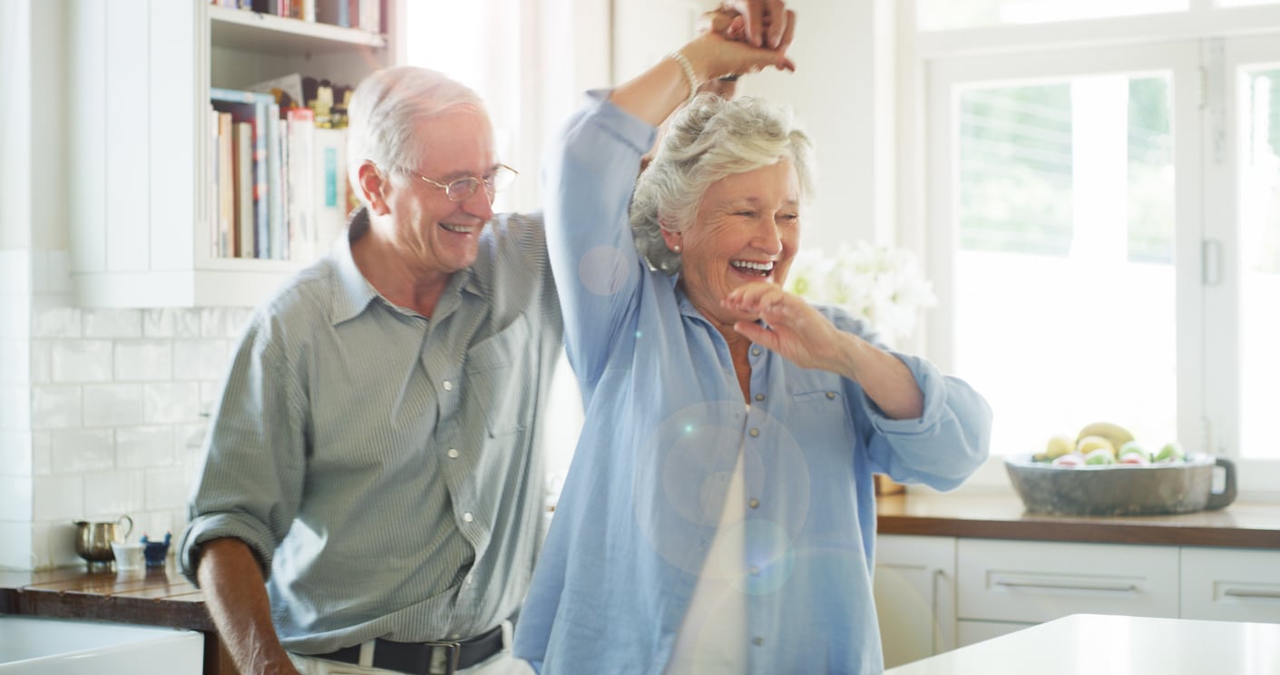 http://a%20man%20and%20woman%20dancing%20together%20in%20a%20kitchen